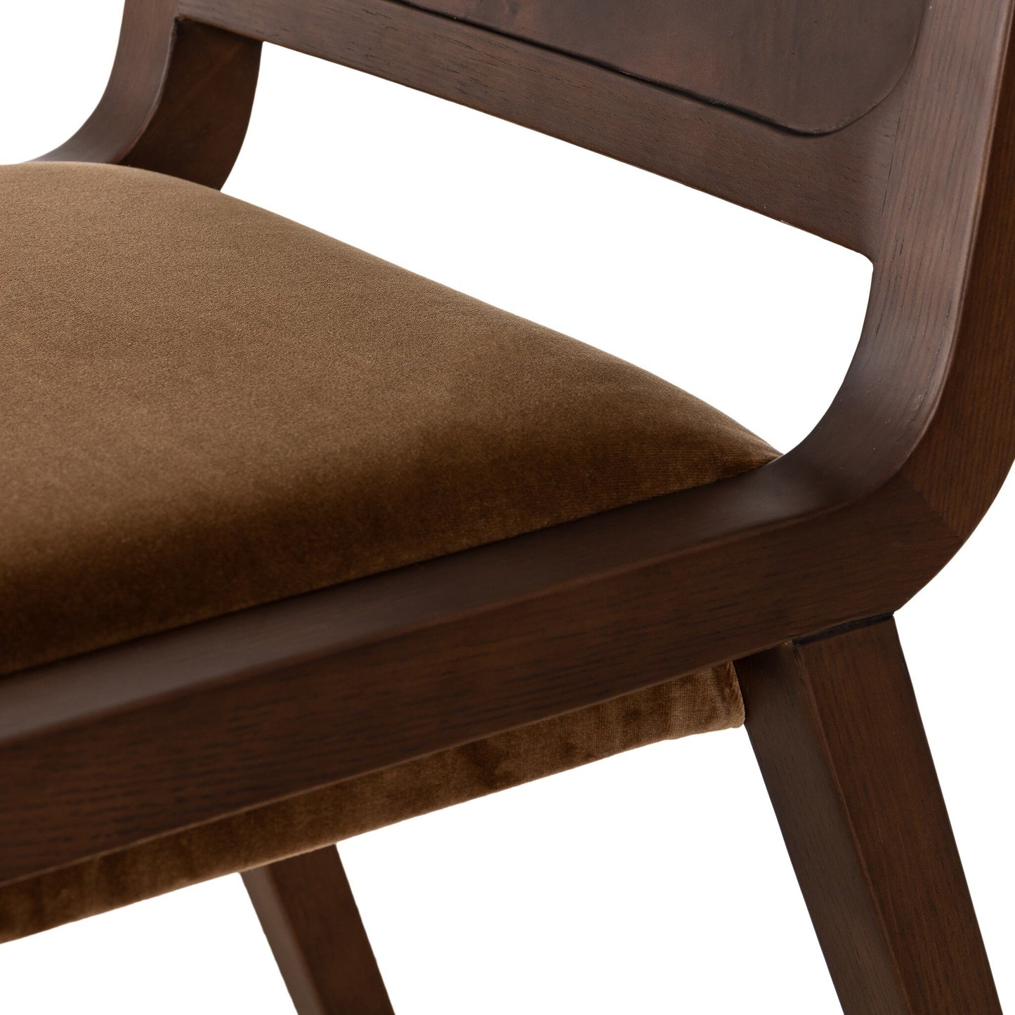 Close-up of the Corvo Dining Chair, featuring a 24.00"d frame with a dark wood finish and a soft, plush brown velvet upholstered seat. The image highlights part of the backrest, seat, and legs.