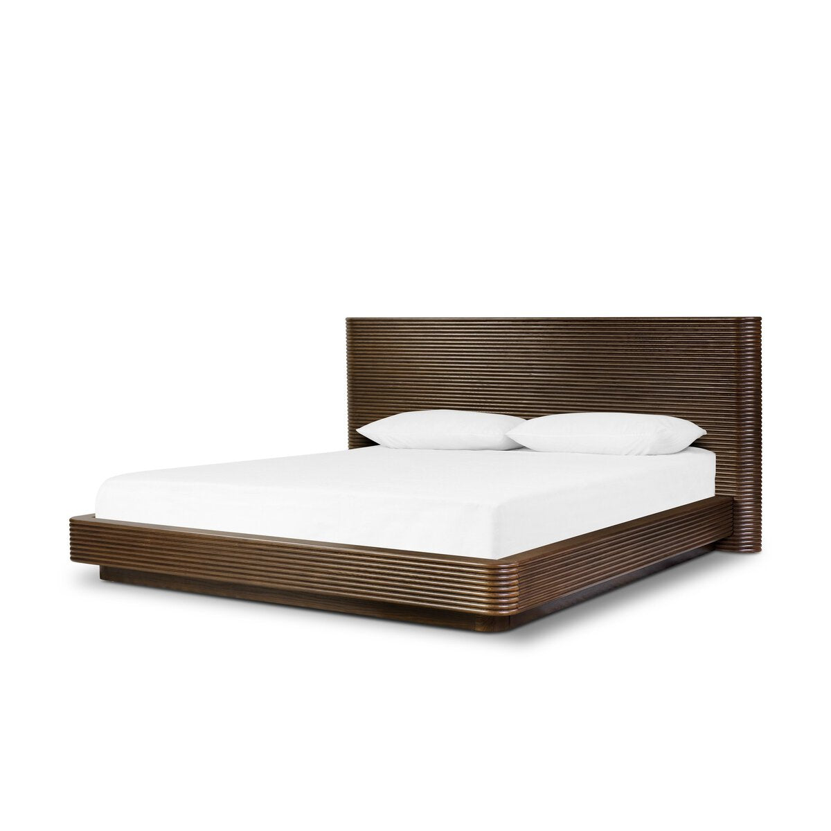 The Benny Bed features a modern horizontal slatted wooden frame with headboard, shown with a white mattress and two pillows. Please check furniture measurements to ensure the overall dimensions fit your space. Displayed on a plain white background.