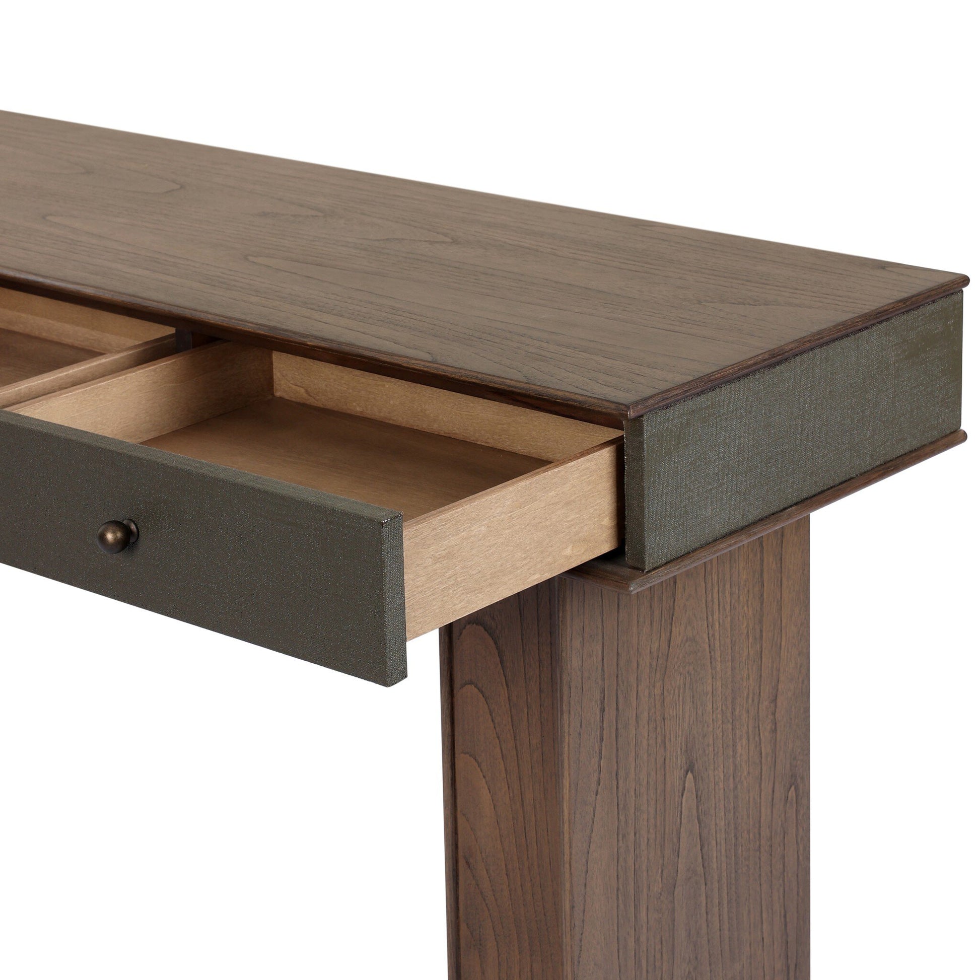 A close-up of the Soloman Console Table shows its dark brown wood finish and simple design. One leg and two drawers—one partially open—are visible, providing stylish storage for your dining room.