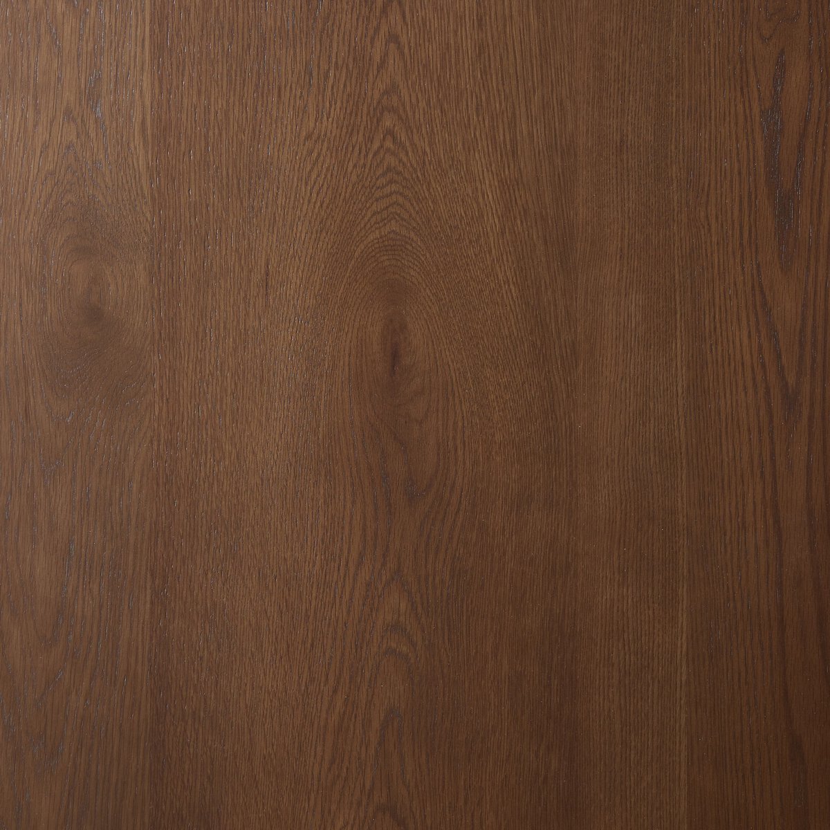 Close-up of the Lola Coffee Table's smooth wooden surface, highlighting natural wood grain and a warm brown hue—perfect for complementing sofas of various sizes in your living area.