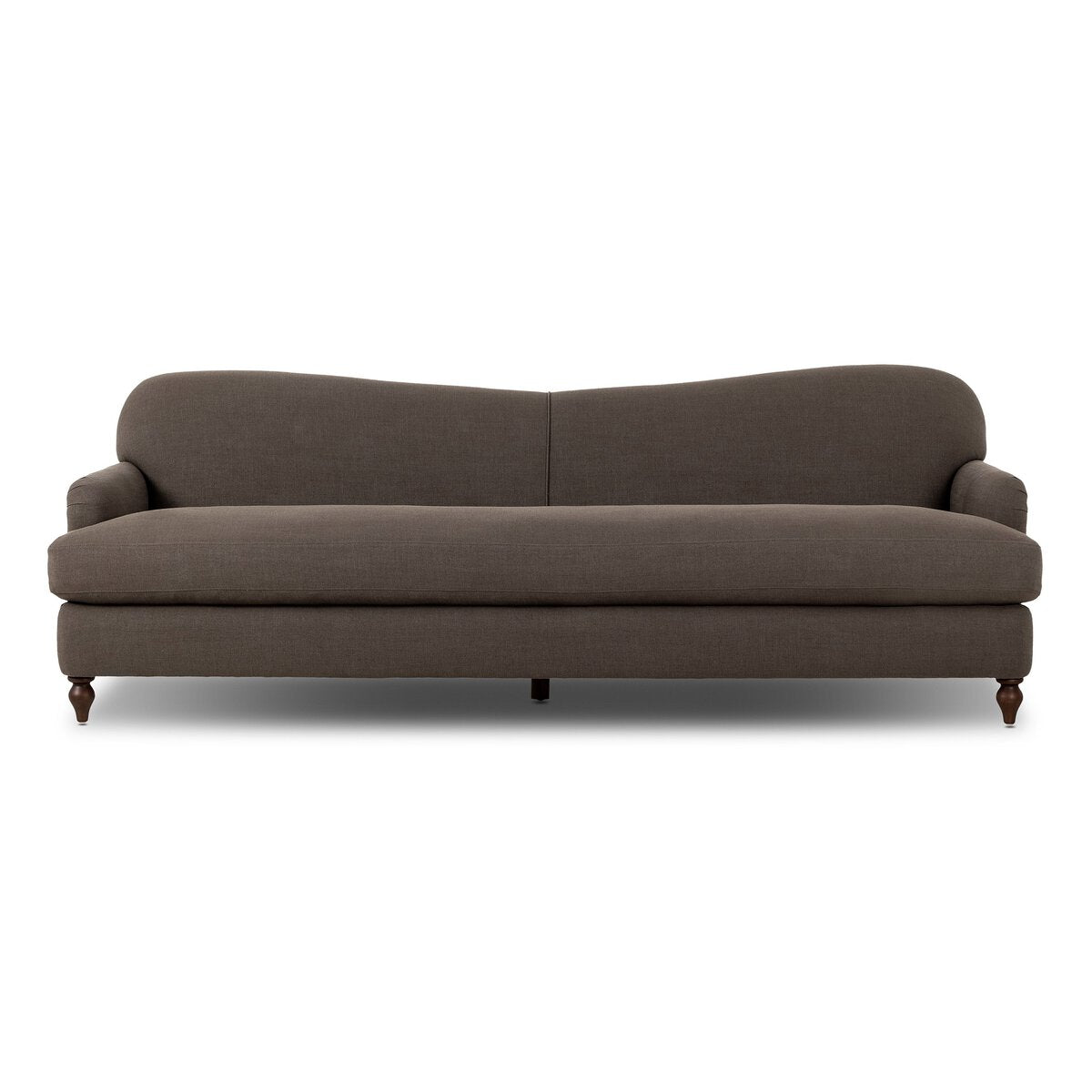 A front view of the Tiani Sofa in dark brown upholstery features a gently curved backrest, low rounded arms, and four short wooden legs, highlighting its elegant design and compact size.