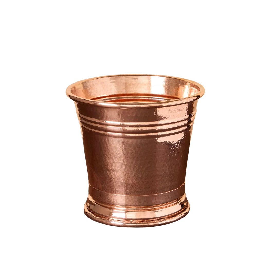 A Copper Ice Bucket with a hammered texture, flared rim, and decorative horizontal bands is displayed against a plain white background.