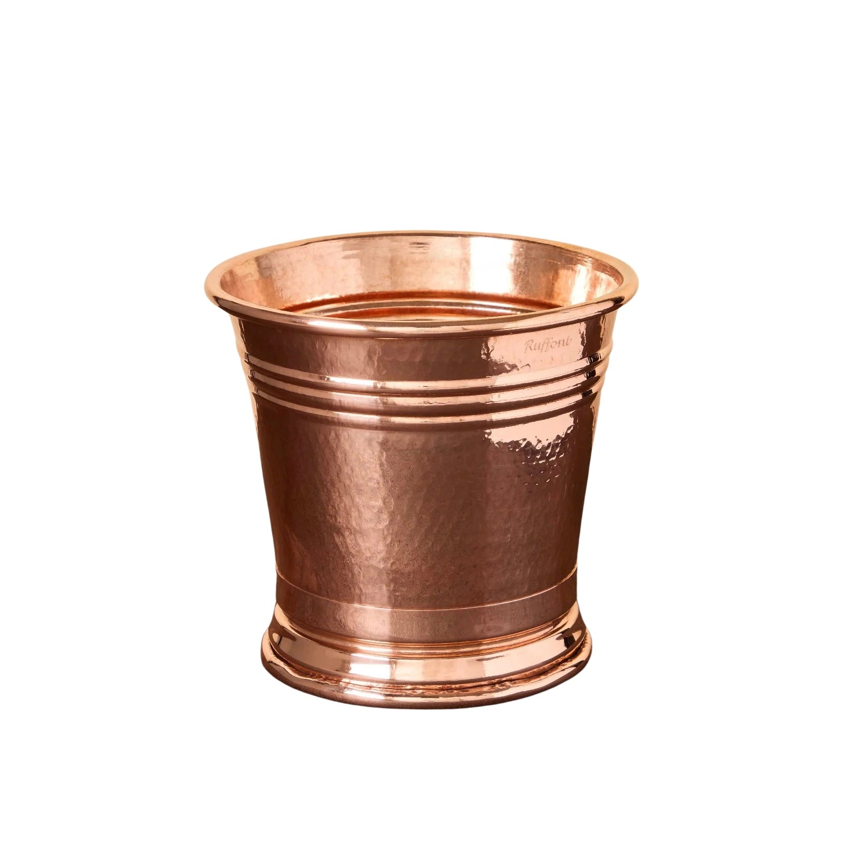 A Copper Ice Bucket with a hammered texture, flared rim, and decorative horizontal bands is displayed against a plain white background.