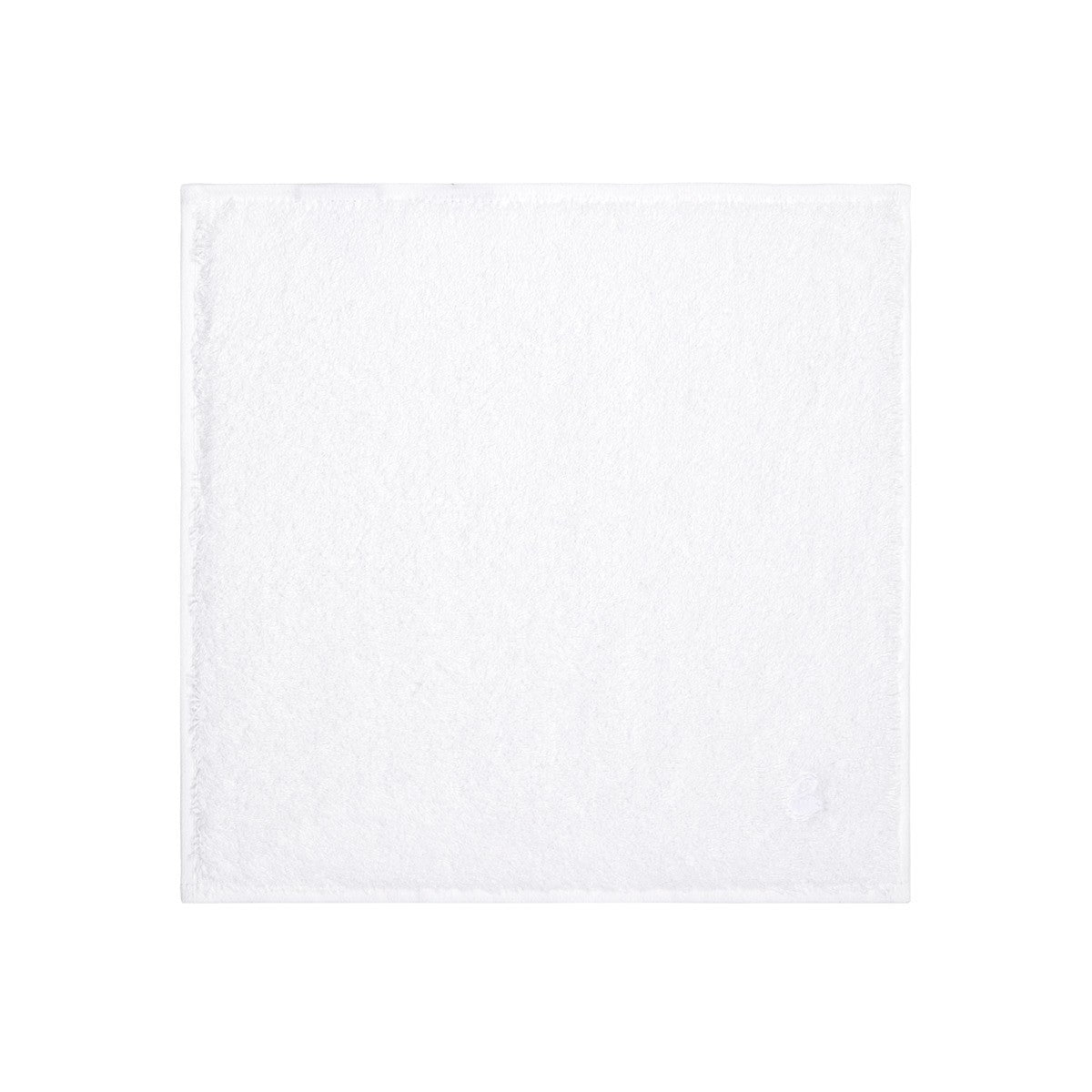 An Yves Delorme Bath Towel, featuring a plain white square design and a soft, fluffy texture, is displayed against a white background.