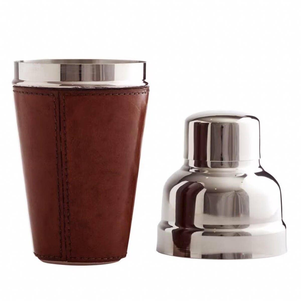 The Leather Cocktail Shaker Brown features a stainless steel body with a brown leather sleeve and matching polished cap—a stylish blend of classic and modern design for any sophisticated barware collection.