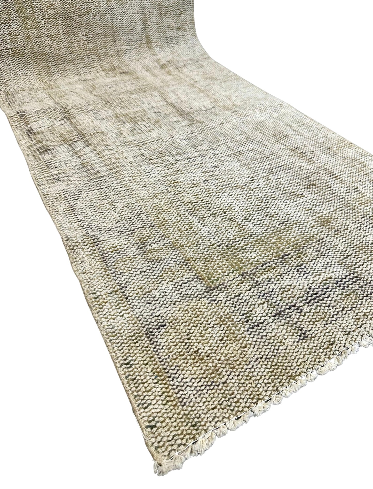 A close-up of the Handmade Vintage Runner 3x9 reveals its woven beige and off-white design with subtle patterns and fringed edges—ideal as a hallway runner or accent rug.