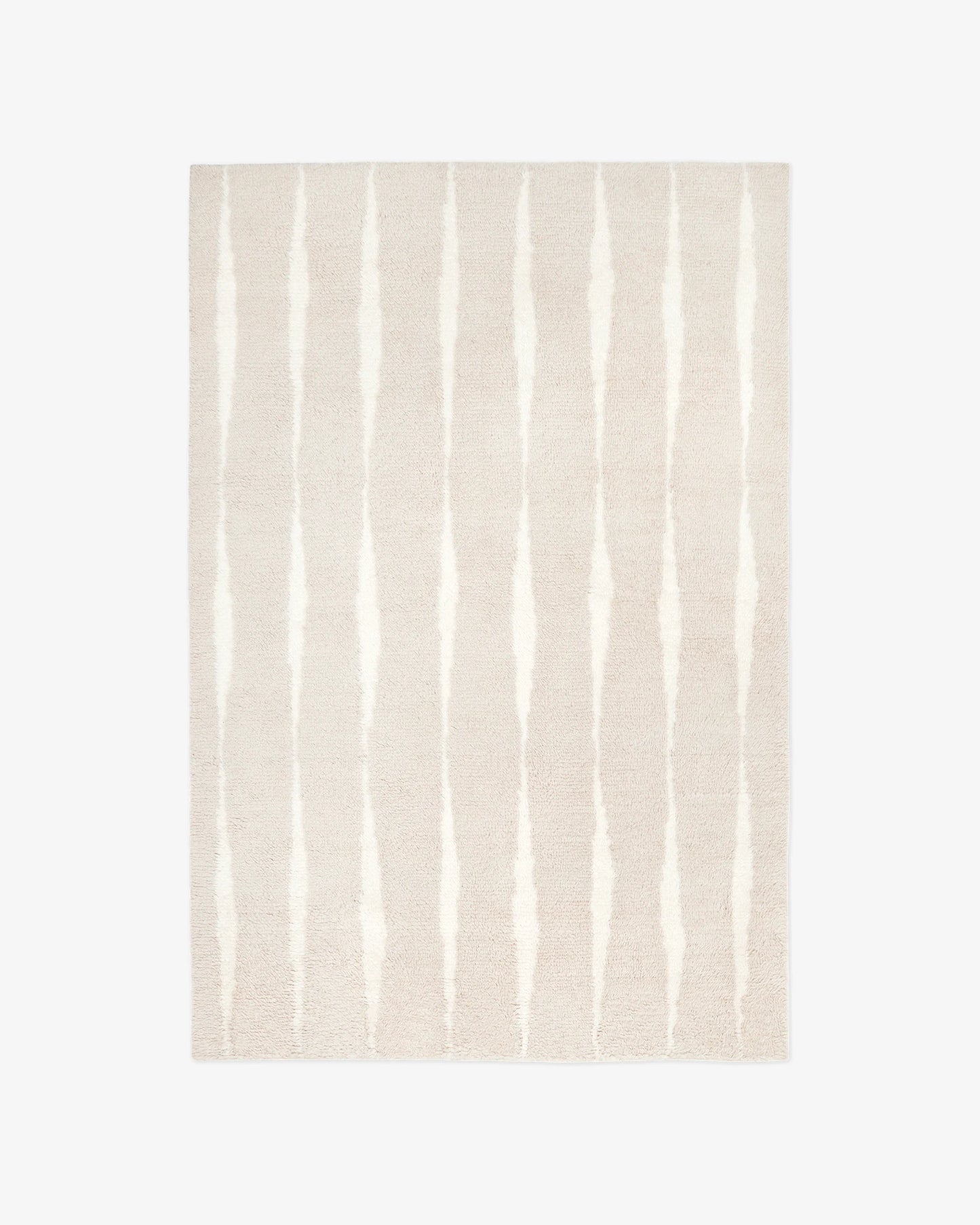 The Shag Pale/Sand Rug features a light beige background with evenly spaced, vertical irregular white stripes.