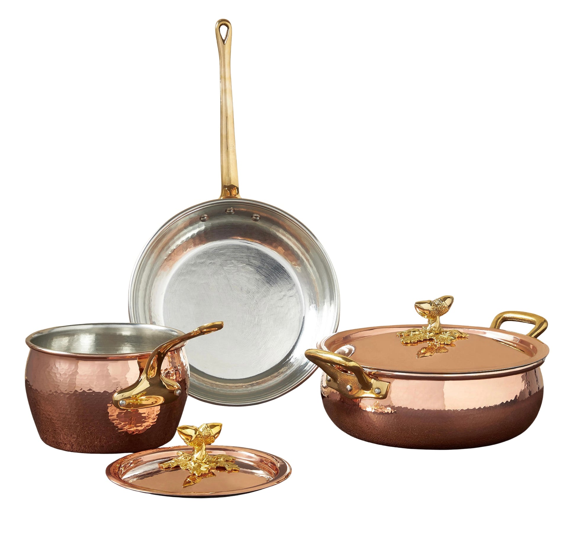The Copper Cookware Set features hammered copper with gold-tone handles and decorative lid knobs. Includes a frying pan, saucepan, and covered pot—all with elegant, shiny finishes for a stylish look.