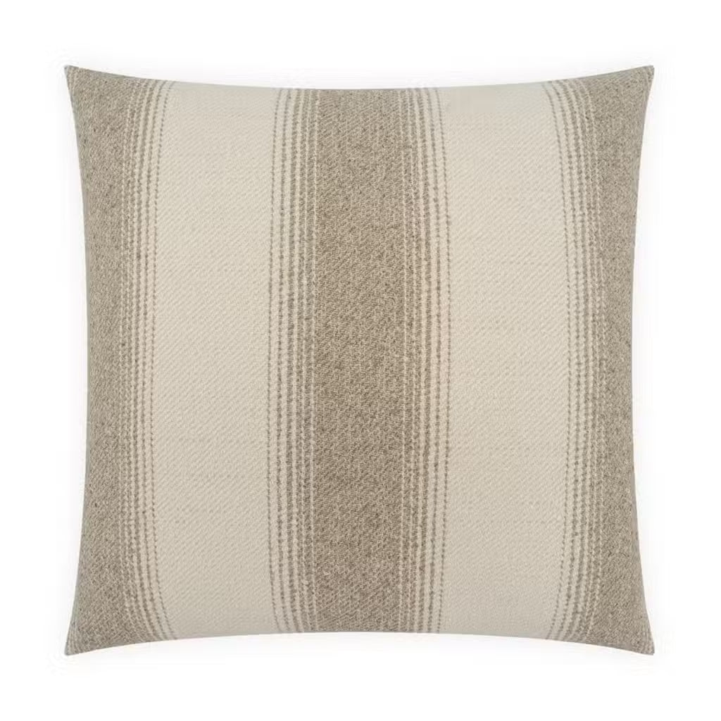The Natural Stripes Pillow is a square throw cushion with vertical beige and cream stripes, featuring alternating thick and thin textured bands for a simple, neutral modern style. Crafted from polyester for durability and style, this versatile accent complements any contemporary space.