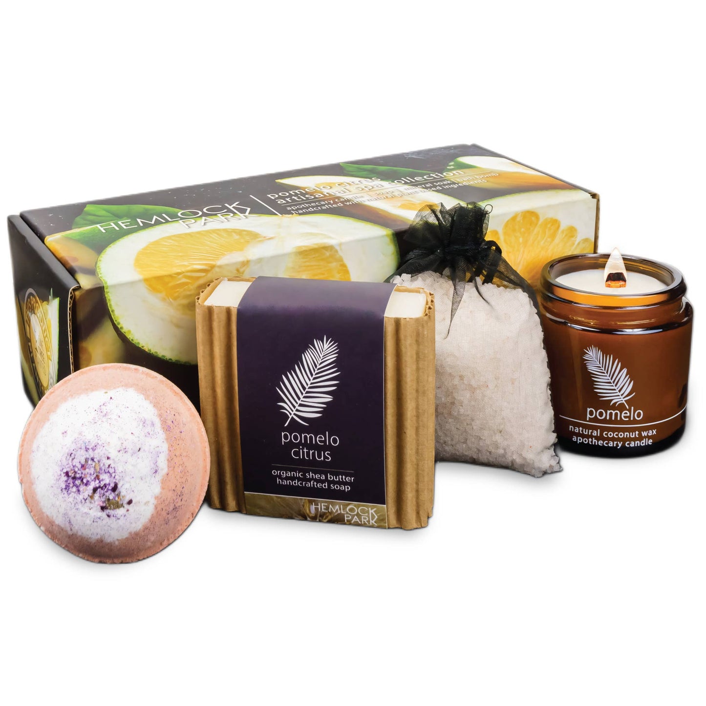The Artisanal Spa & Candle Gift Box includes a Hemlock Park Pomelo Citrus box, organic shea butter soap bar, jar candle, bath bomb, and bath salts—all elegantly displayed on a white background.