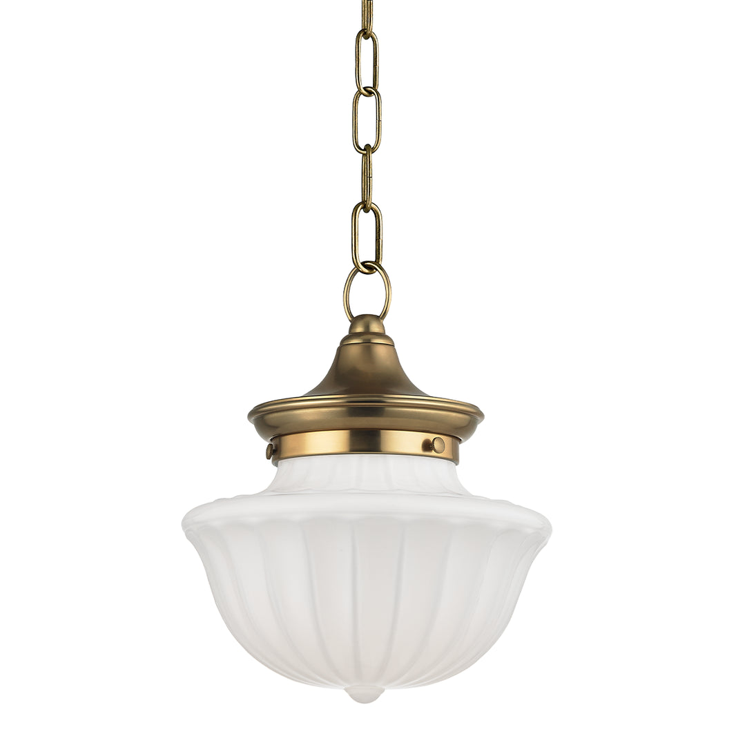 The Aged Brass Pendant features a vintage-style design with a frosted ribbed glass shade (approx. 9" x 11.25"), brass fixture, and brass chain suspension.