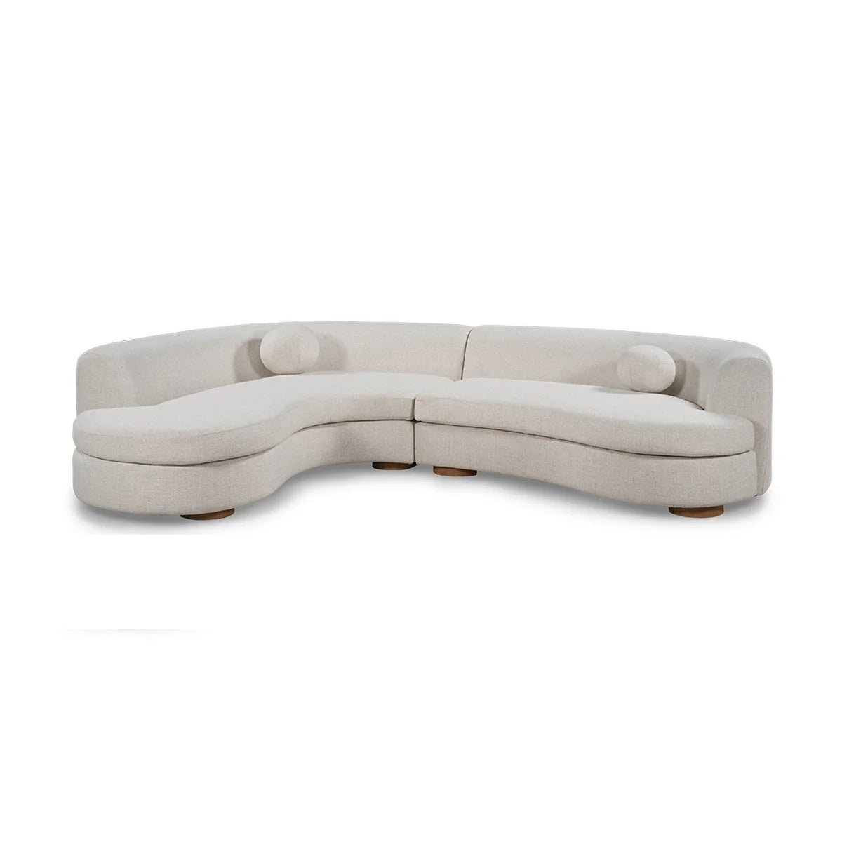 The Curved Upholstered Sectional - Ivory features a modern, minimalist design with smooth white fabric, two matching cylindrical cushions, and low wooden legs—an elegant centerpiece for any living room.
