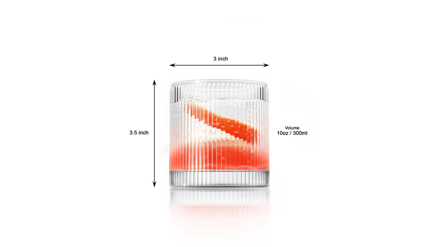 The Vintage Straight Line Tumbler - 10 oz (1pc) is shown on a white background, filled with a red and white layered drink. Arrows highlight its height (3.5"), width (3"), and capacity (10 oz / 300 ml).