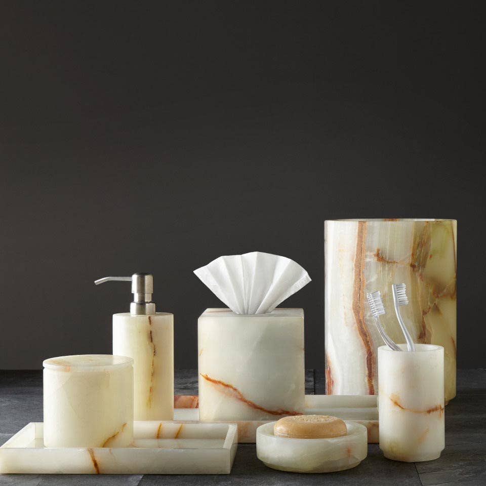 The Green Onyx Bathroom Set features a soap dispenser, tissue box, toothbrush holder, tray, lidded container, soap dish, and waste bin displayed against a dark background.