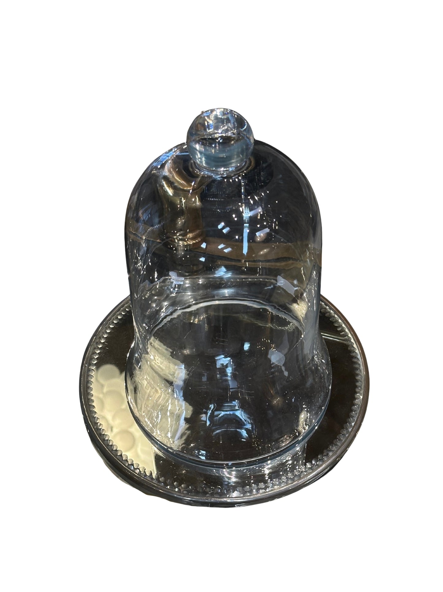 A Mirrored Tray and Cloche.