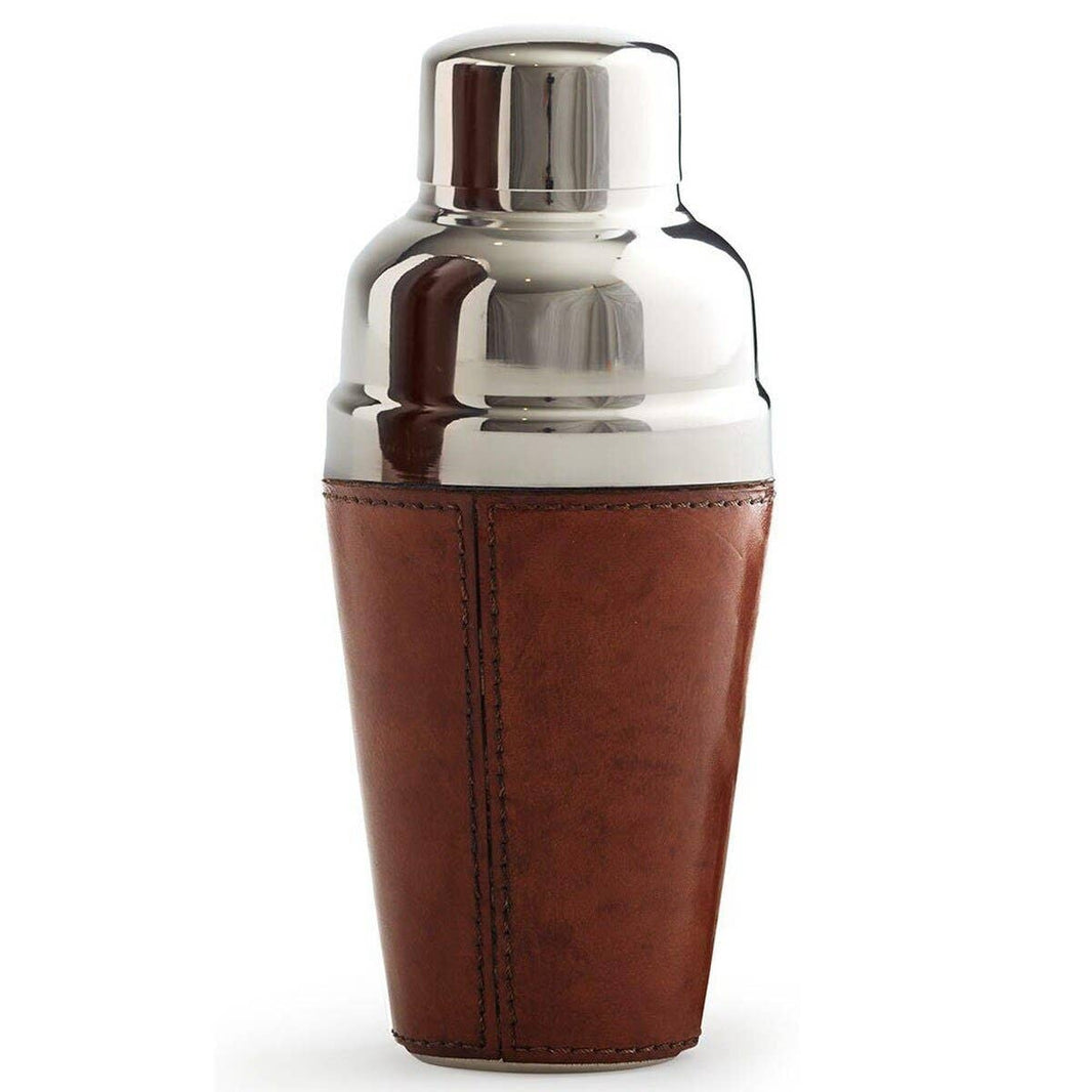 The Leather Cocktail Shaker Brown features a shiny stainless steel finish and a stylish brown leather wrap for enhanced grip—an essential barware piece for any sophisticated cocktail setup.