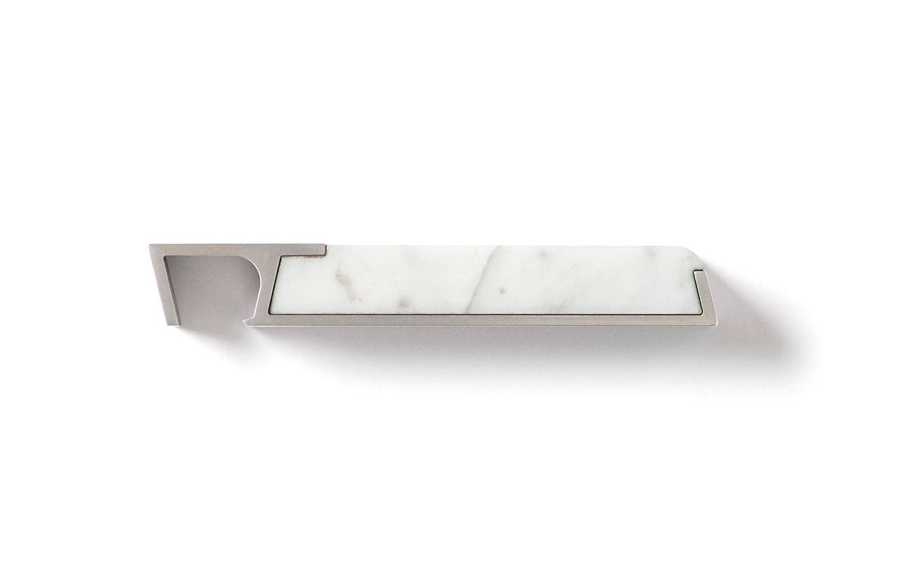 The Modern Marble Bottle Opener features a sleek metal body and a rectangular white marble inlay for an elegant, heirloom-quality touch. Photographed on a white background.