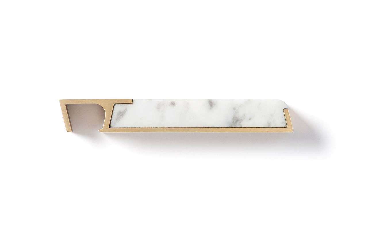 The Modern Marble Bottle Opener features heirloom quality with a gold-toned metal frame and a rectangular white marble inlay, displayed on a white background.