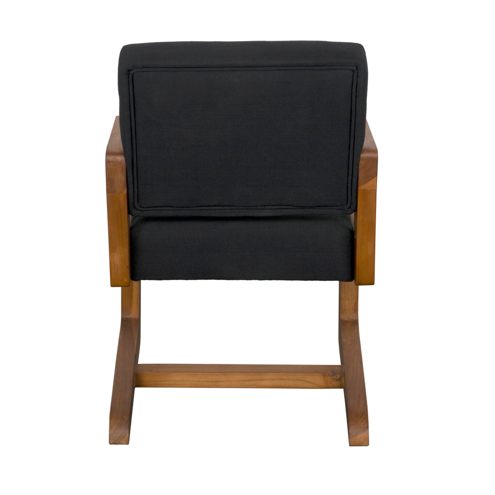 The Bruce Chair features a teak frame with black cotton upholstery on the seat and backrest, shown from the back against a white background—an ideal addition to any contemporary living space.