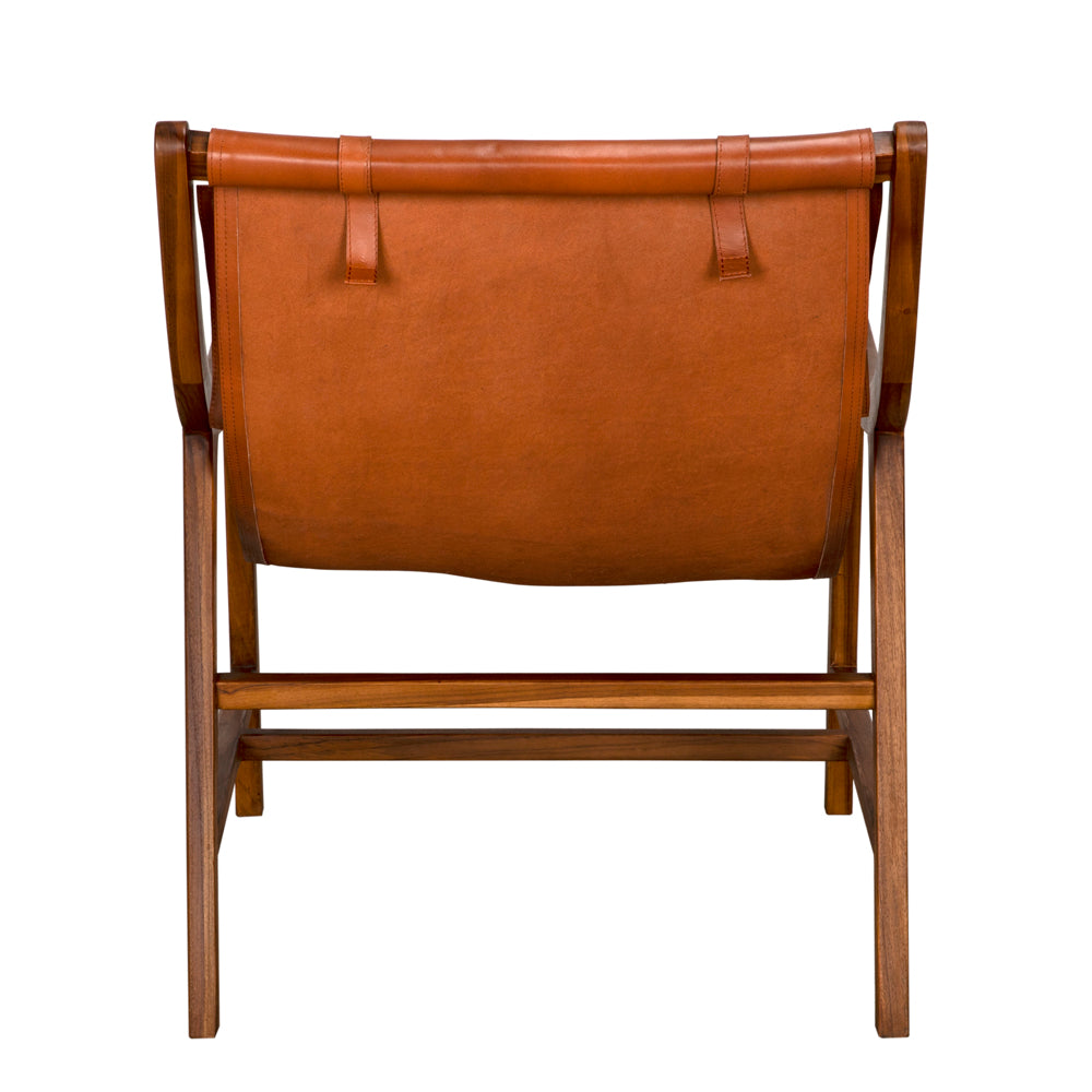 The Gilberto Chair features a teak frame and brown leather backrest, viewed from behind. Its clean lines and simple construction create a modern, contemporary look.