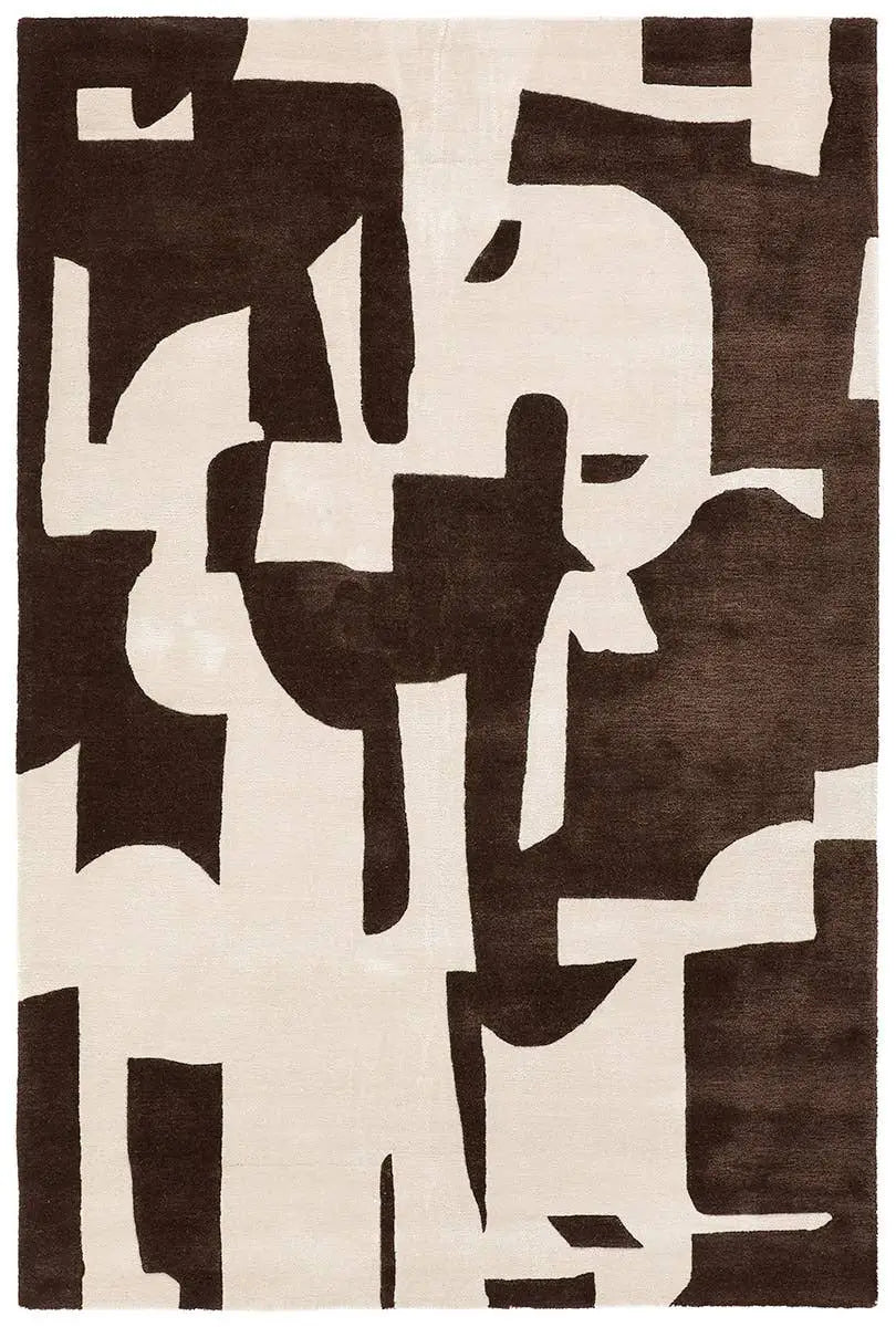The Abstract Forms Rug - Brown/Ivory is a hand-tufted rectangular wool-viscose rug with an abstract geometric pattern in bold cream and dark brown shapes, creating a modern look with high contrast and irregular forms.
