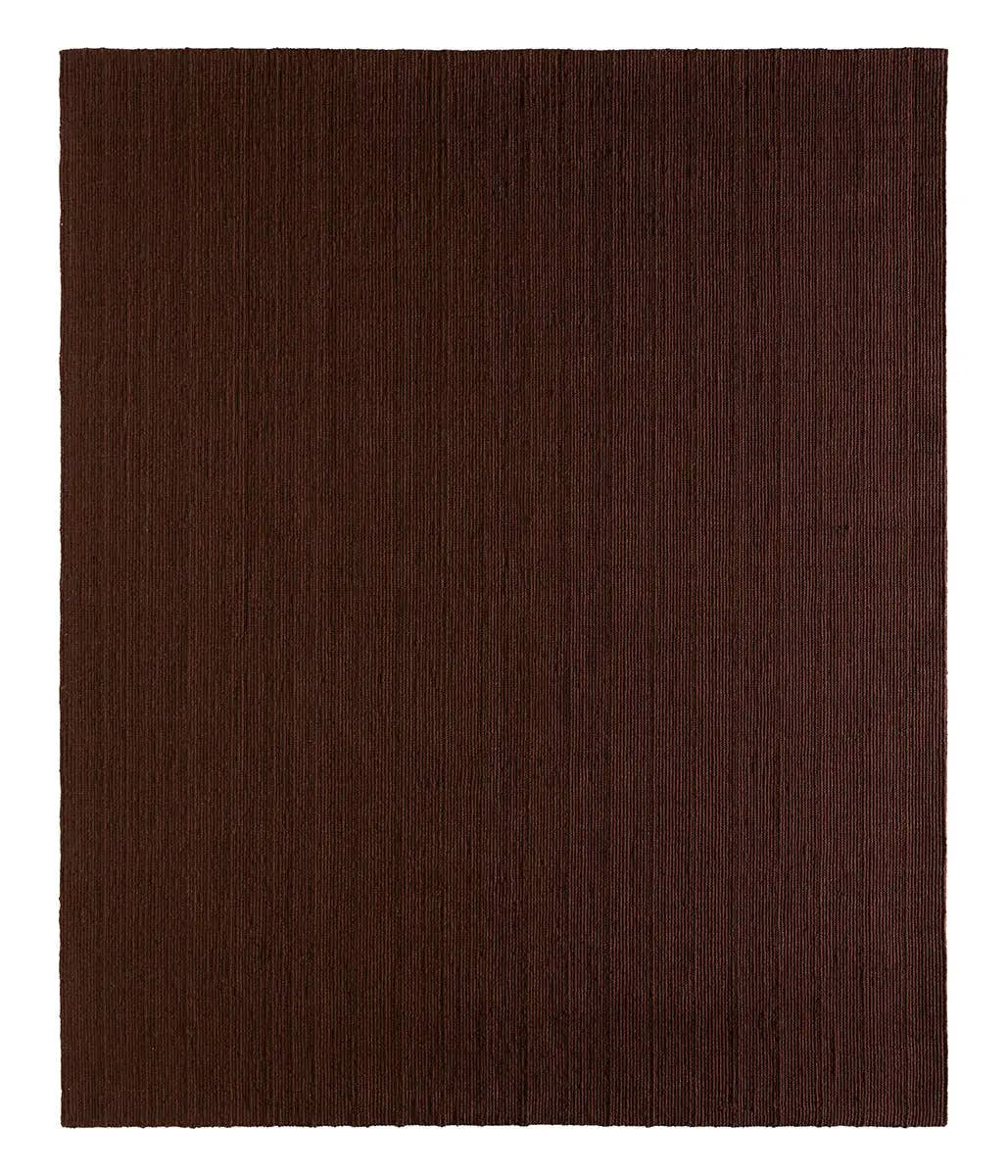The Maroon Handwoven Rug is a large, rectangular area rug featuring a dark brown textured surface with subtle vertical lines, displayed on a white background.
