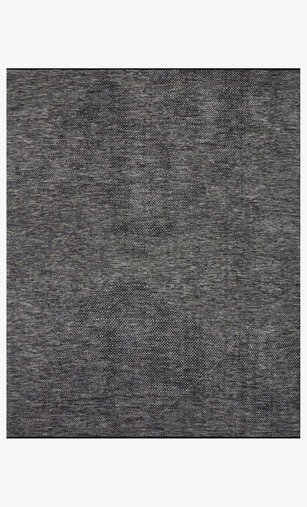A close-up of the Demin Wool Rug 8 x 10 shows a gray, textured wool surface with a fine weave pattern. The material is soft with slight variations in shade and texture. Available in multiple sizes.