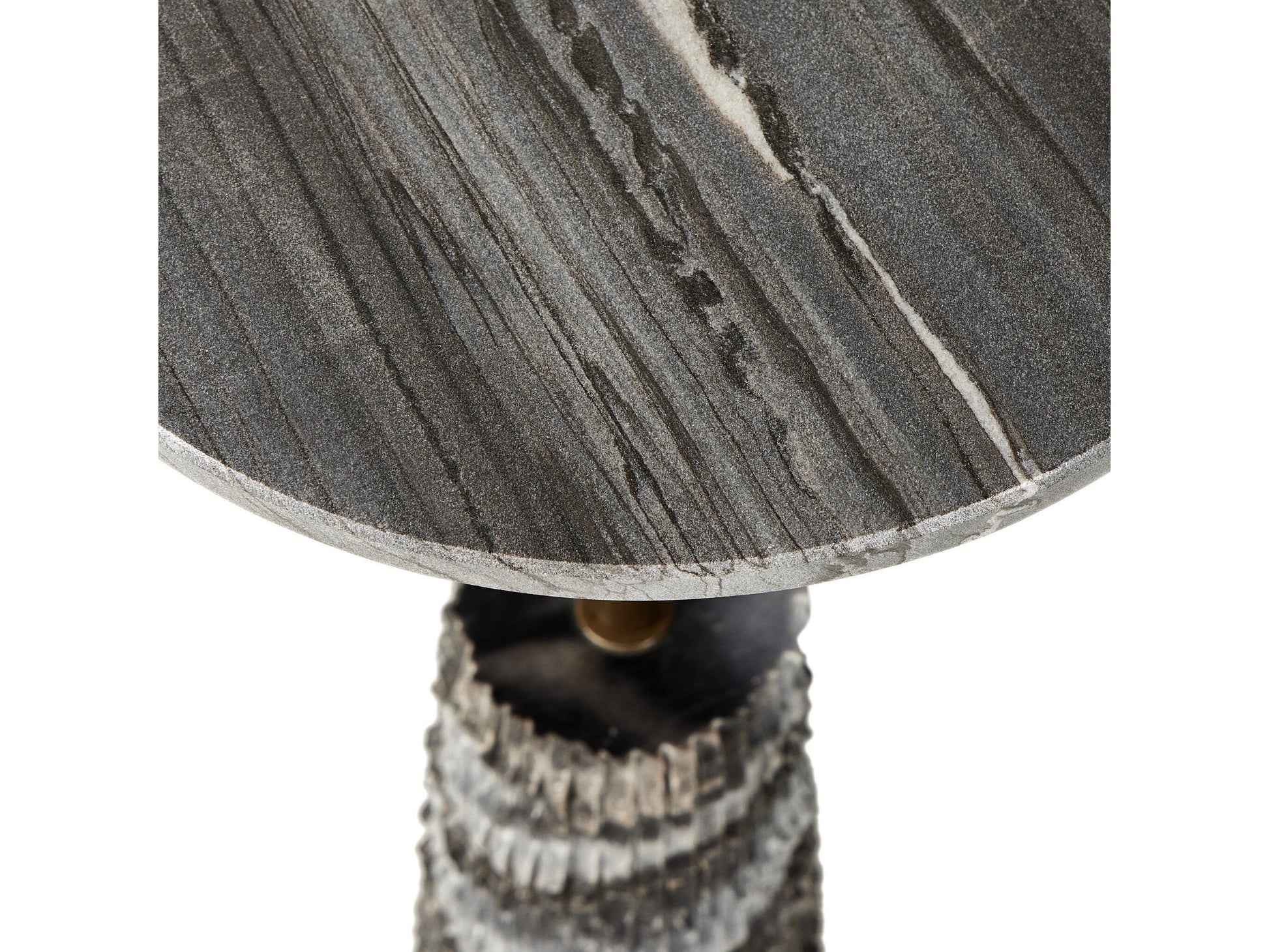 A close-up of the Raven End Table highlights its textured, dark gray stone top with natural white and black veining, elegantly supported by a ridged stone pedestal. Measuring 12″W x 12″D x 22.25″H, this table brings a refined touch to any space while showcasing its elegant, compact proportions.