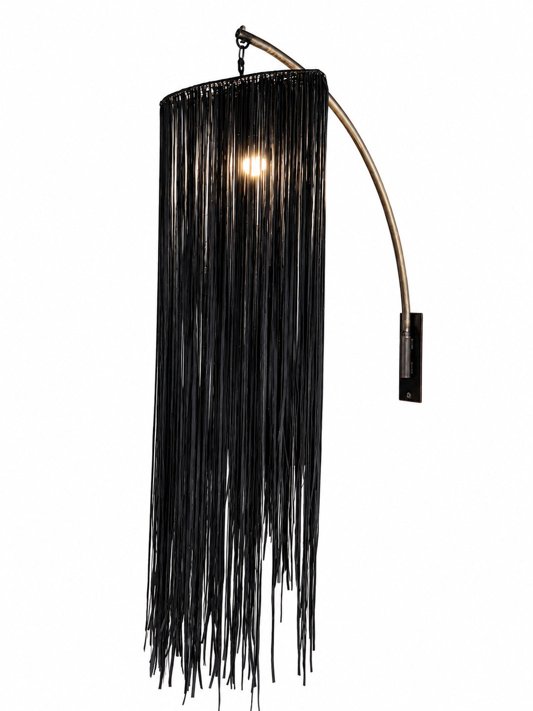 The Vintage Vegan Leather Fringe Sconce features a curved metal arm and black vegan leather fringe strands that partially obscure the bulb, offering an elegant accent for your home lighting ensemble against a crisp white background.