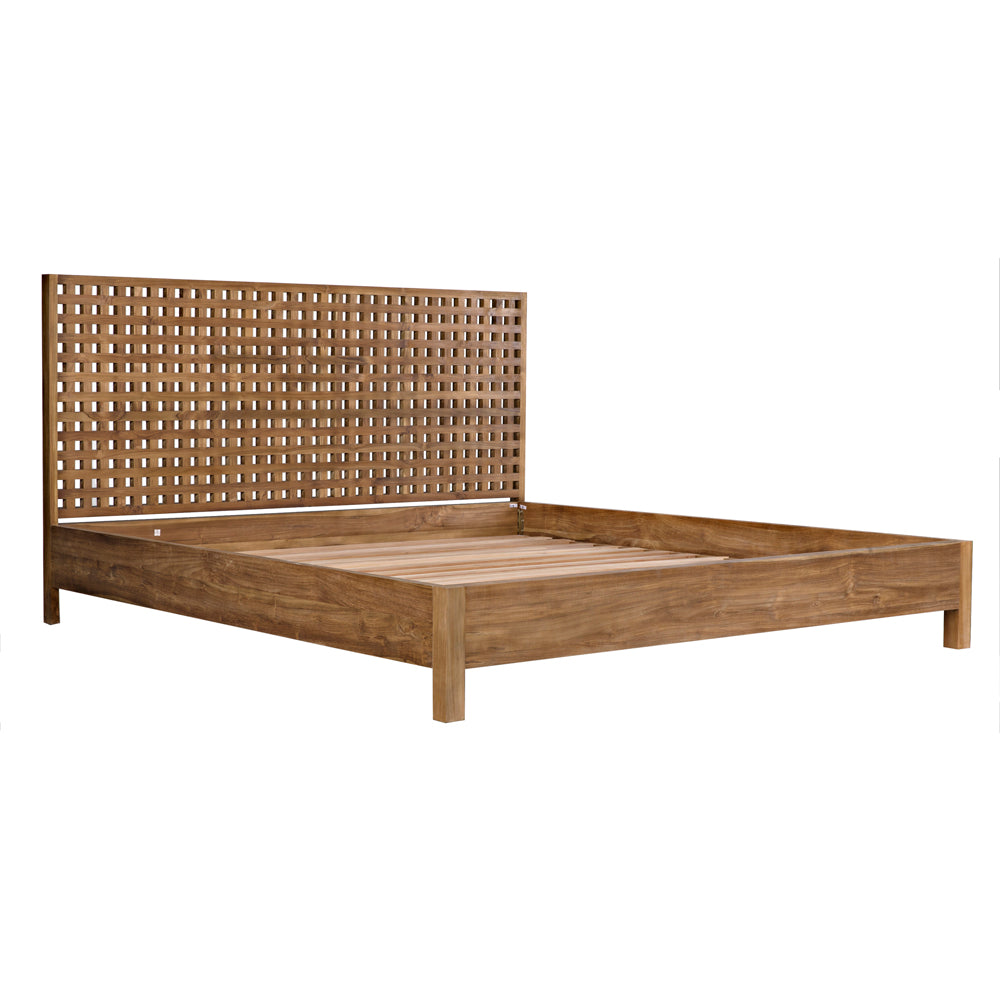 The Quinnton Bed, Eastern King, Teak features a tall rectangular grid headboard with a lattice pattern and natural wood finish. The wooden bed frame is pictured unmade, without a mattress or bedding.