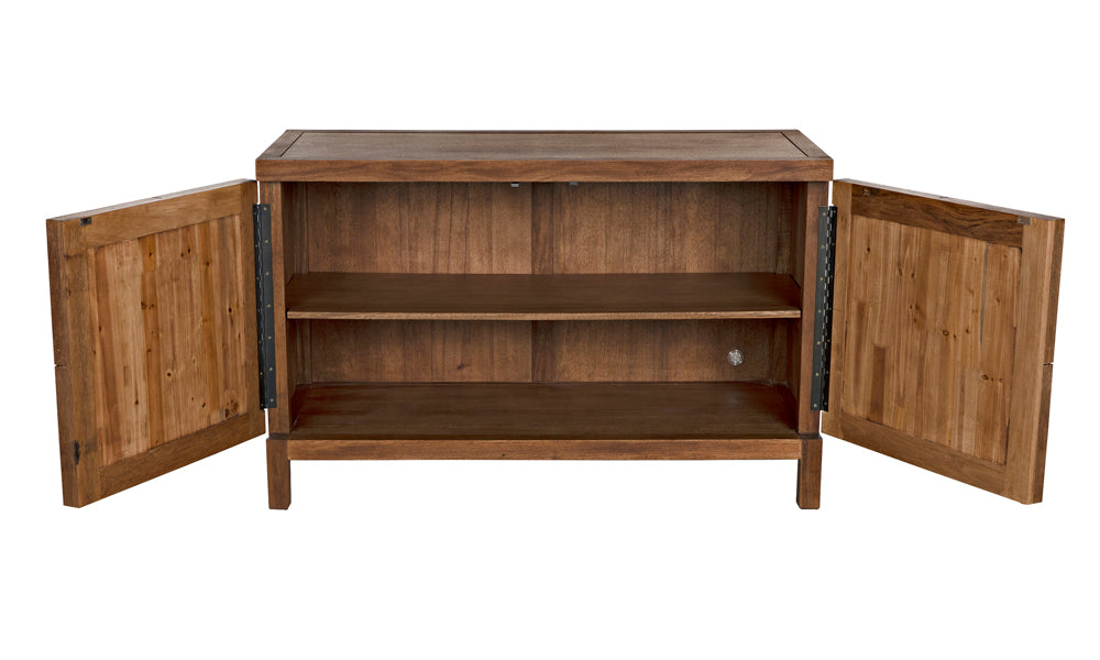 The Quadrant 2 Door Sideboard in dark walnut features two doors with black metal hinges, opening to reveal two shelves inside. This handcrafted cabinet showcases a simple design and a natural wood finish.