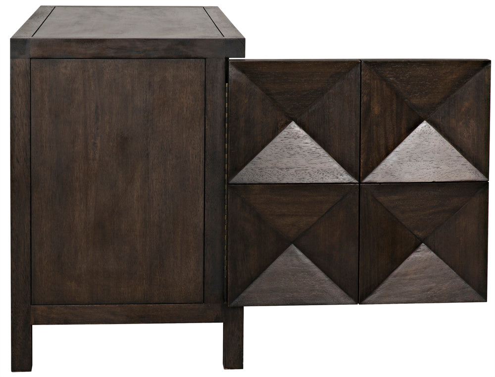 The Quadrant 2 Door Sideboard in Ebony Walnut showcases handcrafted geometric-patterned doors with four square panels. One door is slightly open, revealing the rich dark brown finish of this elegant walnut cabinet.