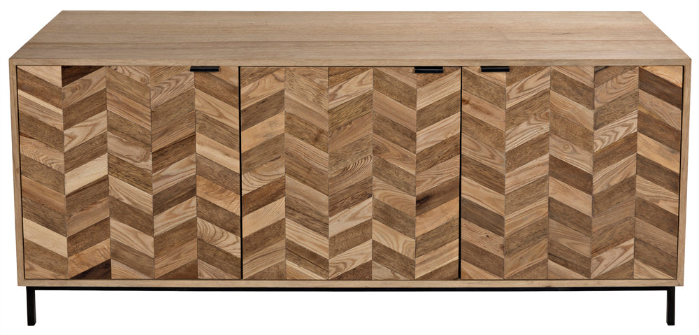 The Herringbone Sideboard is a modern walnut piece with four doors, showcasing a bold chevron wood pattern and slim black metal legs.