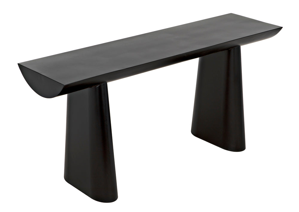 The Winston Console in black metal features a smooth rectangular top and two wide tapered legs, offering a minimalist, sculptural design reminiscent of an altar table.