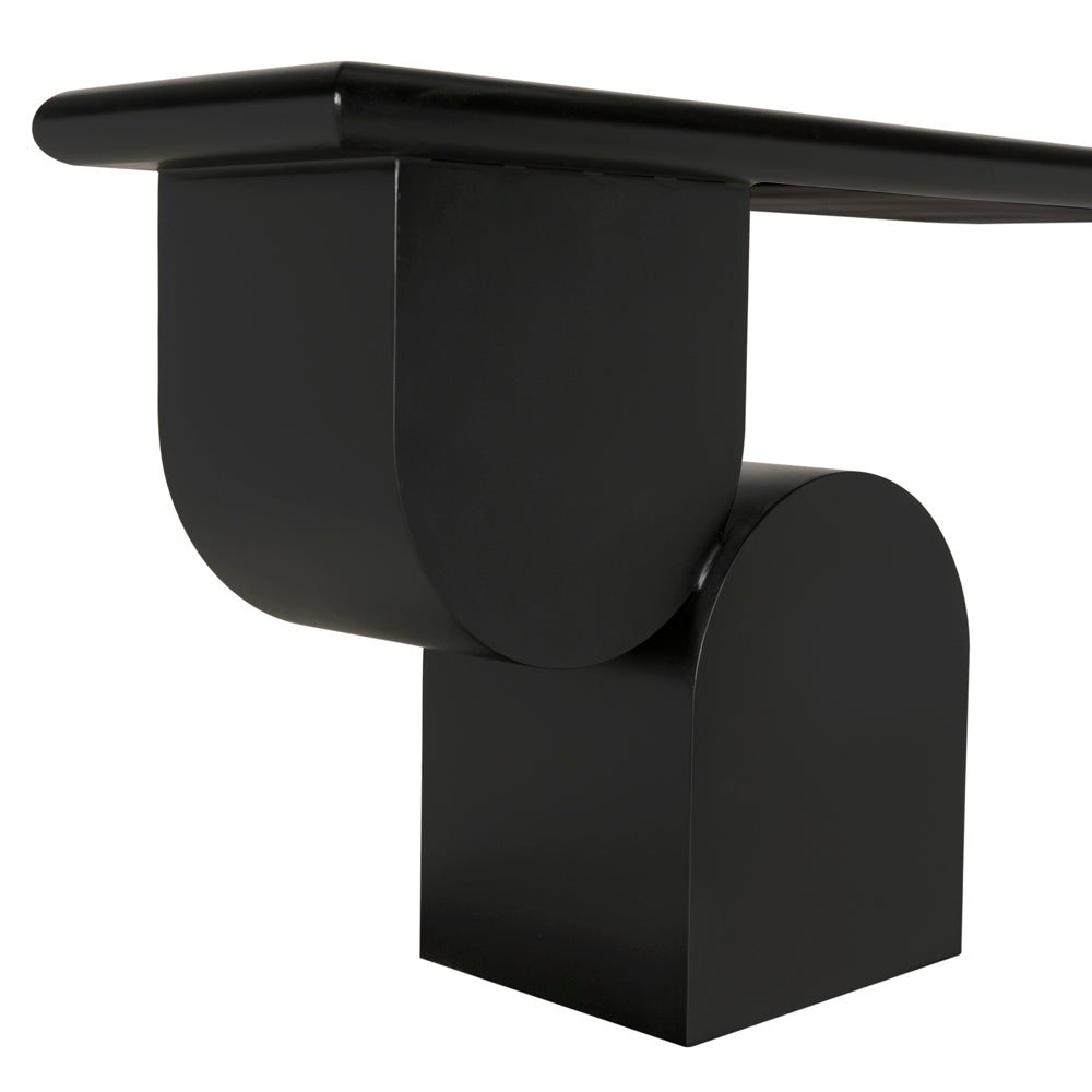 A close-up of the Fraser Console features a glossy black finish, crafted from premium materials with bold geometric legs that curve and intersect for an artistic, sculptural effect.