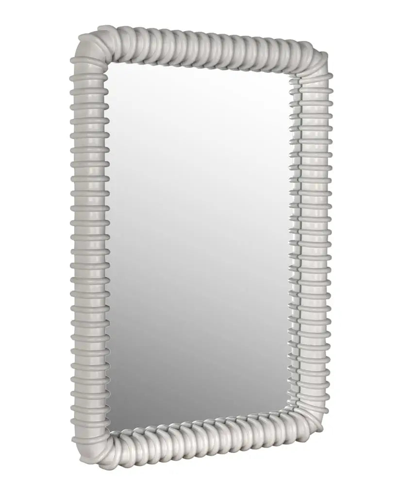 The Sculpted Mahogany Mirror features a thick, textured frame that resembles stacked discs in glossy light gray. Measuring 26.5"W x 3"D x 37"H, it makes a striking wall decor piece, shown slightly angled to the right.