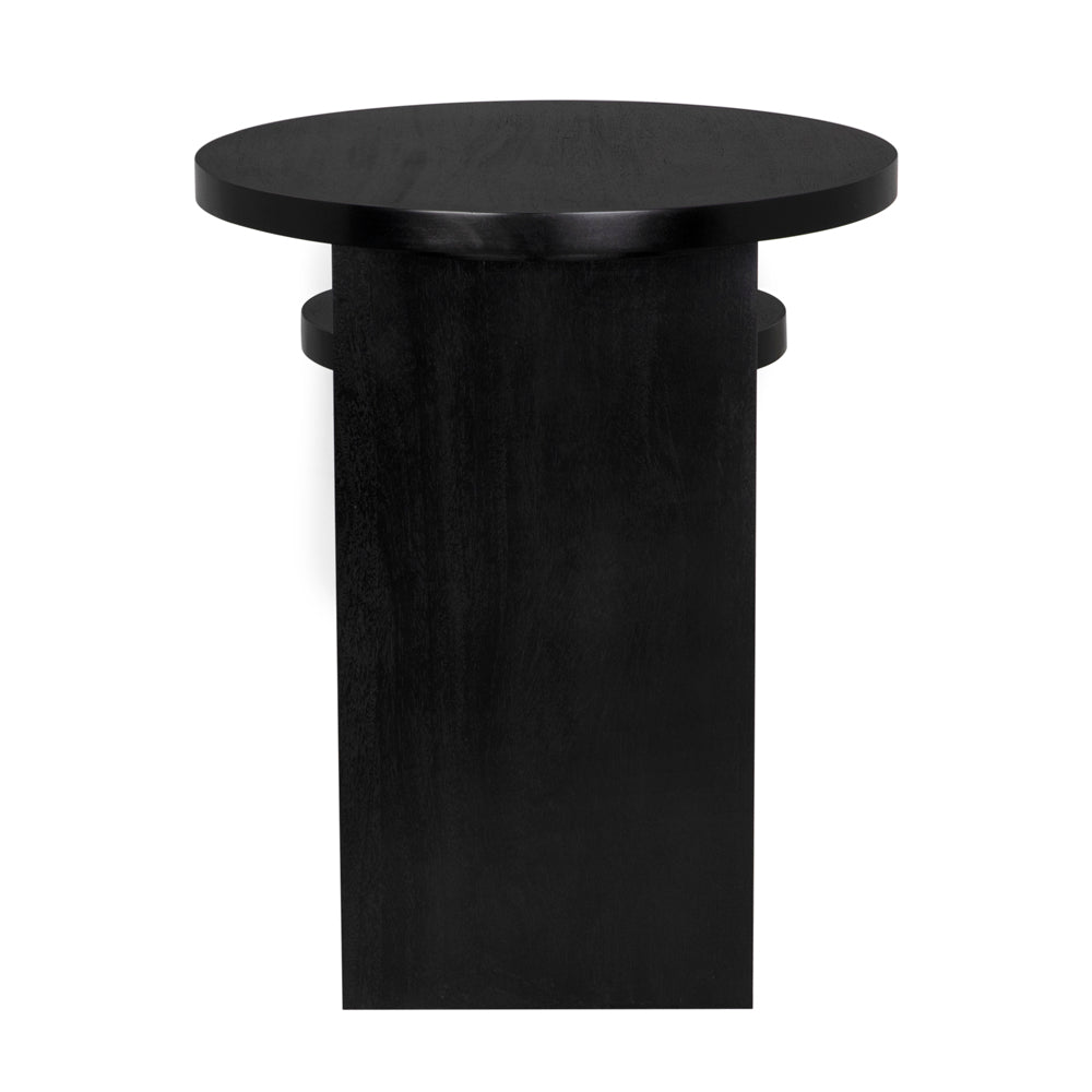 The Mikasa Side Table features a black wooden finish, round top, and wide rectangular pedestal base—making it a chic accent for minimalist, geometric interiors.