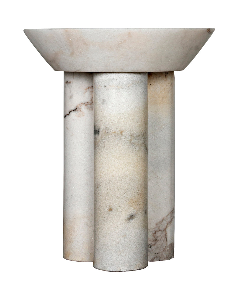 The Nox Side Table features a bowl-shaped marble top with natural stone veining in light gray and beige, supported by four cylindrical legs for a modern, elegant look.