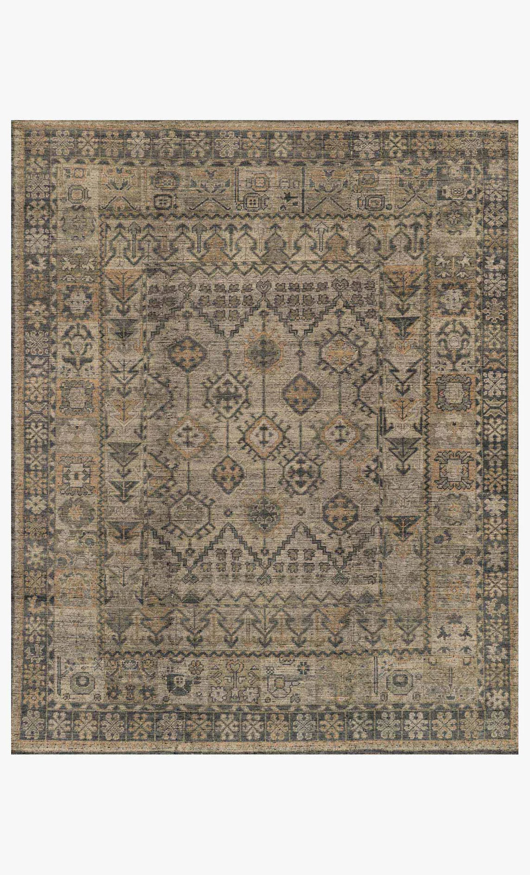 The Heirloom Rug Collection 8 x 10 is a hand-knotted wool rug with ornate, symmetrical geometric and floral patterns in muted brown, beige, and gray tones, finished with a detailed border framing the central motif.