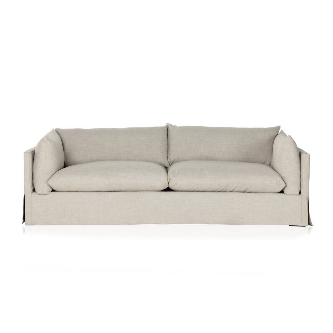 The Slipcover Lounge Sofa features modern light gray upholstery, two large seat and back cushions, and low square armrests. Shown against a white background; overall dimensions: 96.50"w x 40.00"d x 30.00"h.