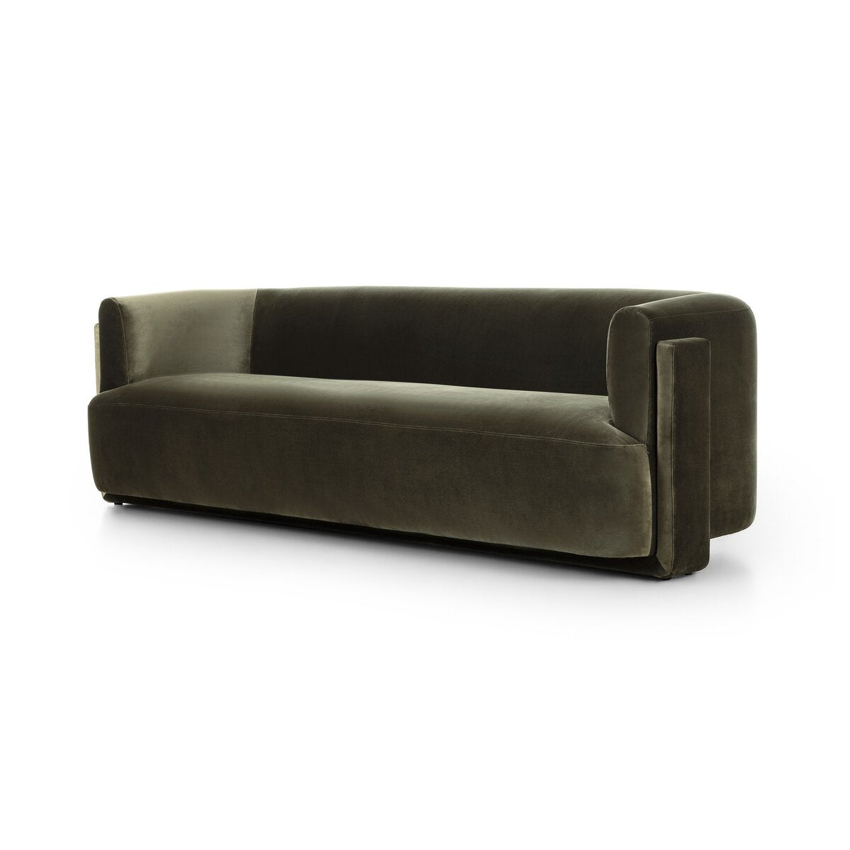 The Exposed Frame Sofa features a modern, dark green fully upholstered design with a low backrest, armrests, rounded edges, and short hidden legs, offering a minimalist look against a white background.