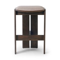 The Hoven Backless Bar + Counter Stool is a modern wooden counter stool with a curved seat, straight legs, and a cross-shaped support structure underneath, shown from the front against a white background.