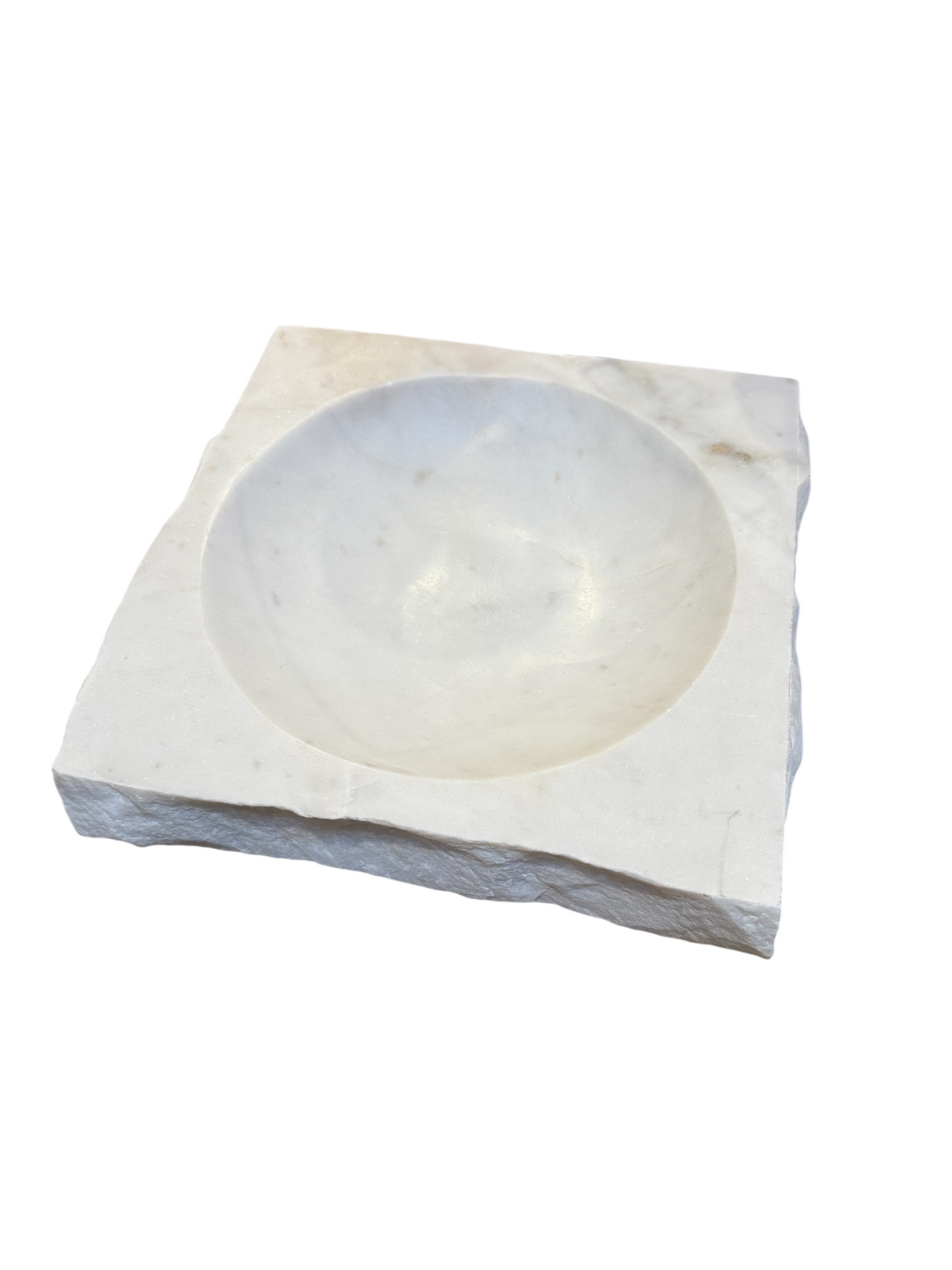 A Live Edge Marble Bowl featuring a smooth, round, shallow bowl set in the center of an 11-inch square marble tray with rough, white edges, isolated on a white background.