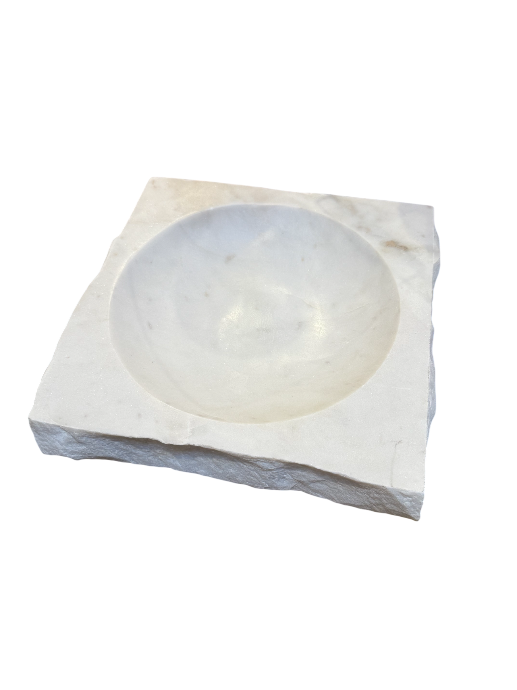 A Live Edge Marble Bowl featuring a smooth, round, shallow bowl set in the center of an 11-inch square marble tray with rough, white edges, isolated on a white background.