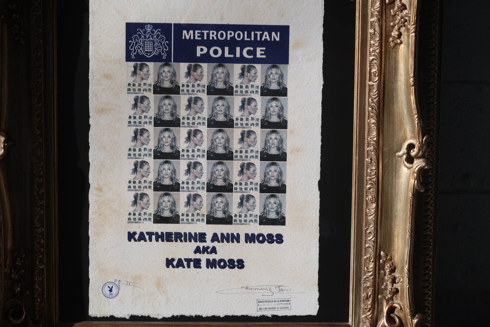 The Kate Moss Print - Vintage Art Deco Frame showcases a 34-inch poster styled as a police lineup, featuring black-and-white portraits and labeled with METROPOLITAN POLICE and KATHERINE ANN MOSS AKA KATE MOSS.