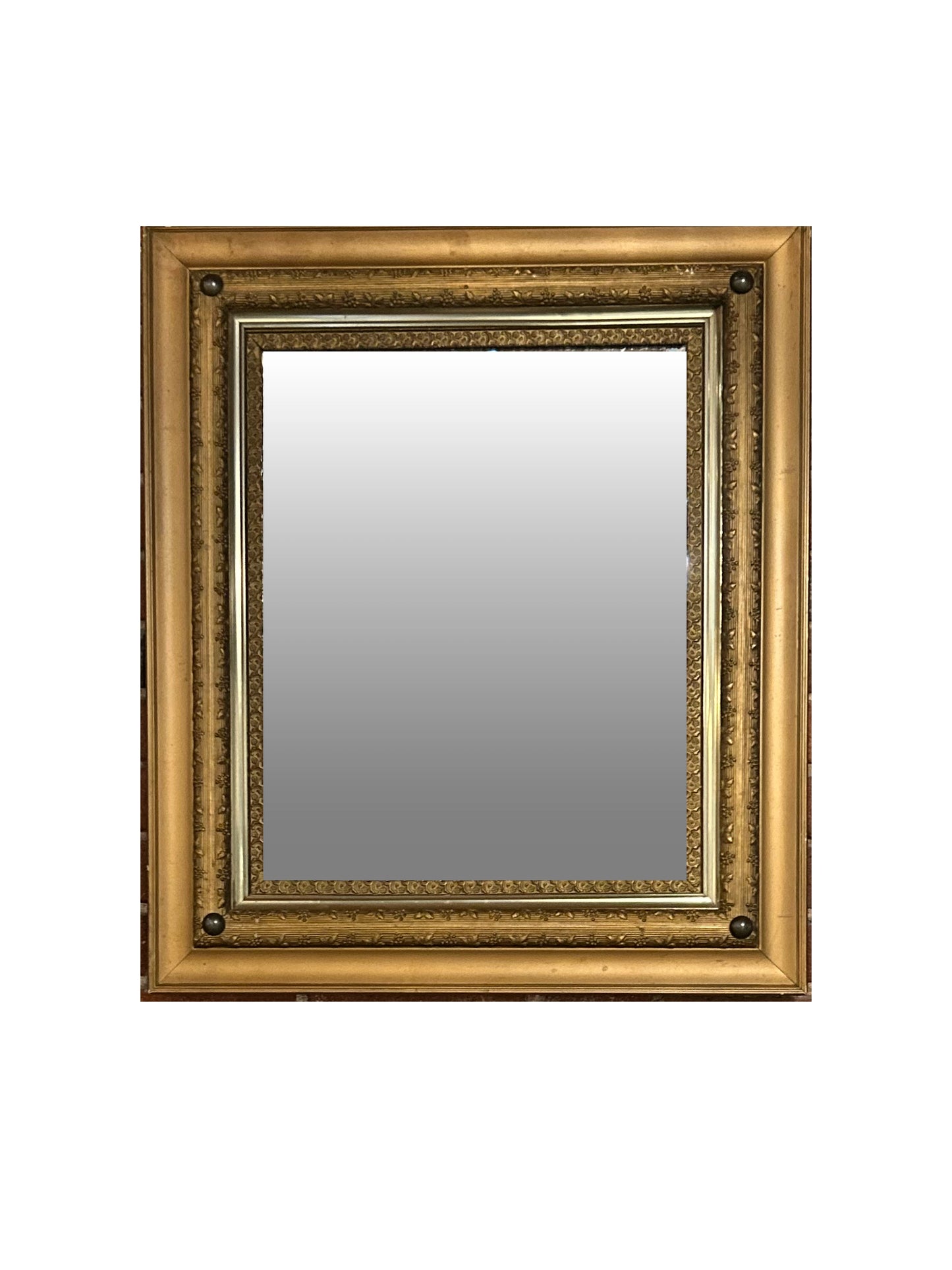 The Vintage Rectangular Gilt Mirror features a gold wood frame with elegant gilt detailing, set against a white background.