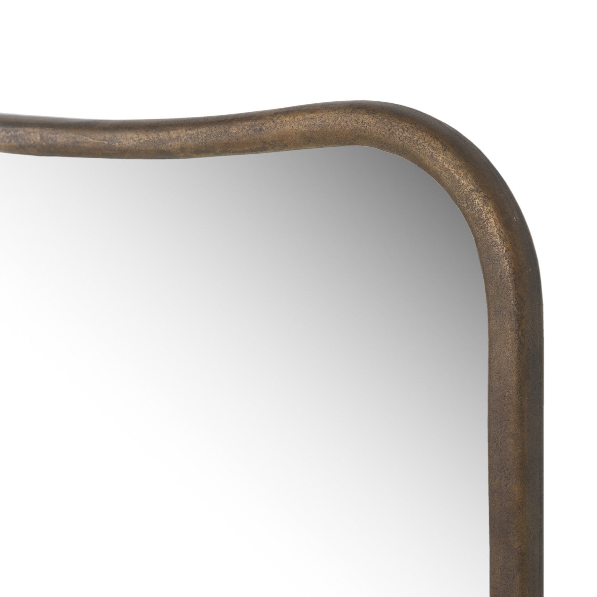 Close-up of the top left corner of the Patz Mantel Mirror, featuring a handcrafted rectangular frame with rounded edges in a rustic bronze finish. Overall dimensions: 40.00"w x 1.75"d x 33.00"h.