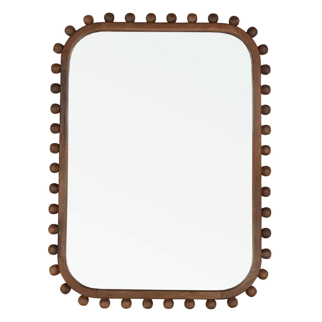 The Mango Wood Mirror features a dark wood frame with evenly spaced spherical knobs, and its rounded-rectangle shape measures 35"W x 47"H—making it a stylish and functional wall art piece for any room.