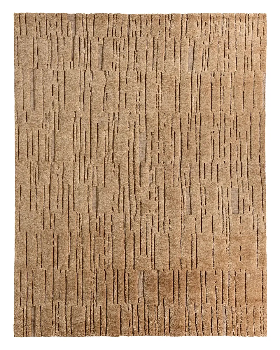 Abstract Geometric Rug: A tan 8x10 rectangular rug featuring an irregular vertical carved-line pattern reminiscent of tree bark or wood grain, expertly crafted from luxurious New Zealand wool for a richly textured, natural look.