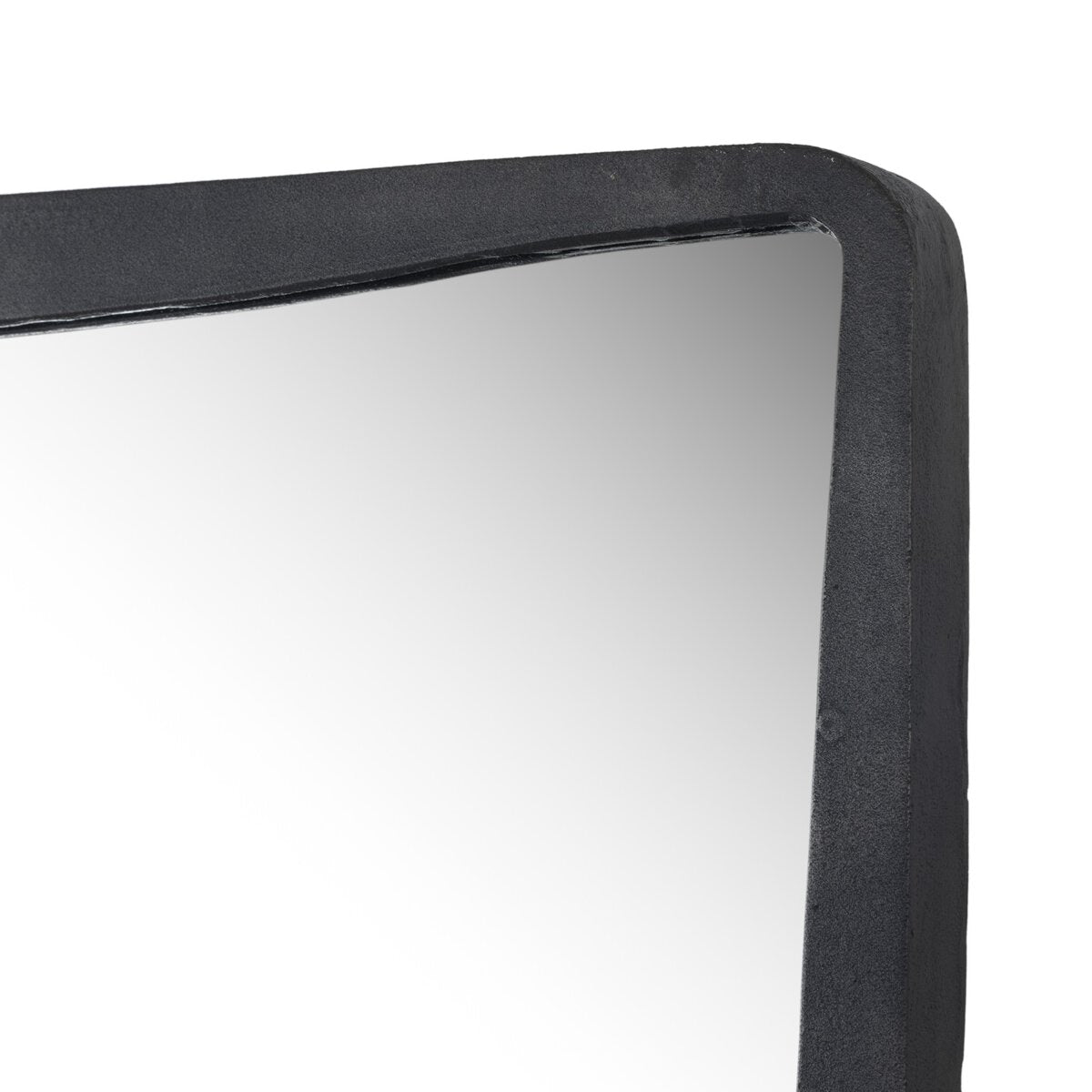 Close-up of the top right corner of the Regis Floor Mirror, featuring a thick, black, slightly curved frame. The rectangular mirror measures 32.00"w x 2.00"d x 80.00"h and is set against a white background.
